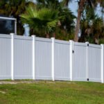 Planning Vinyl Fence Layouts for Sloped Fort Pierce Yards